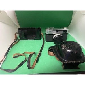 Taron Camera with Taronar 40mm f/1.28 Lens and leather case